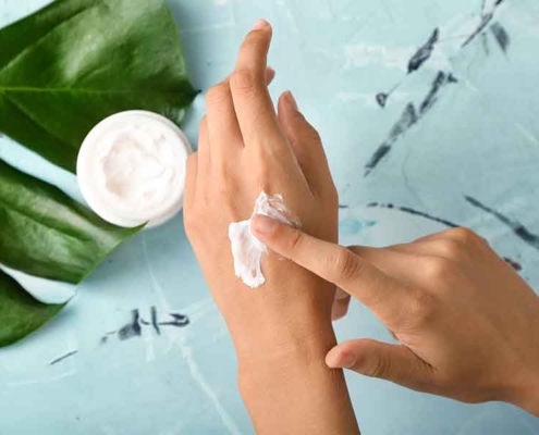 Applying Moisturizer On Hands