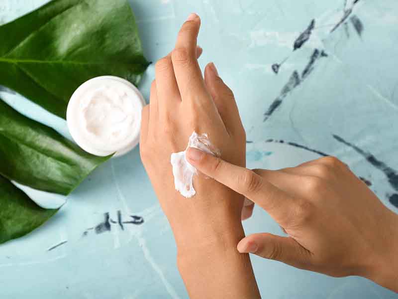 Applying Moisturizer On Hands