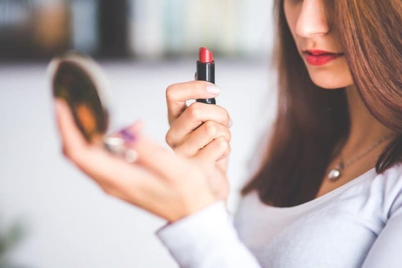 Back-to-School-e1590657964826 Woman Holding Lipstick and Compact