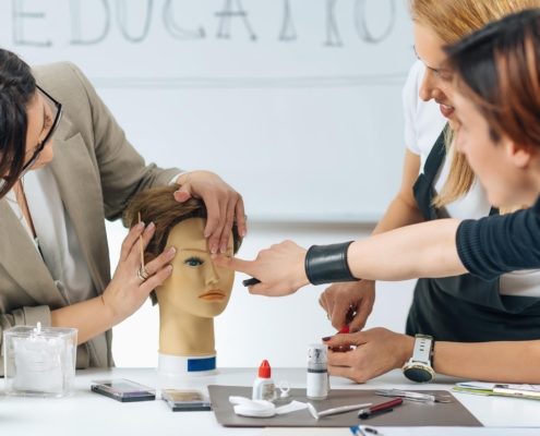 Cosmetology students learning