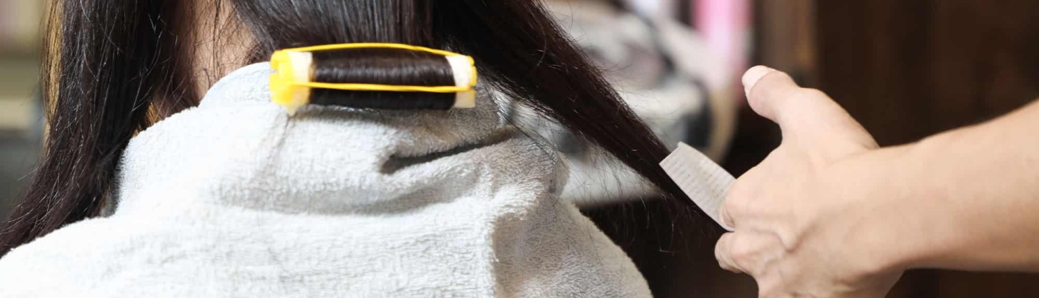 Customer-in-cosmetology-school-getting-haircut How to Get Into the Beauty Industry