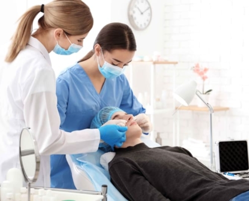 Medicial Estheticans Working on Patient