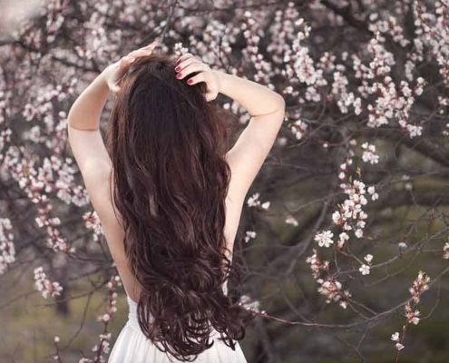 girl with long pretty hair in the spring
