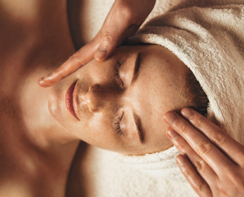 Close Up Of Young Woman Getting Spa Massage Treatment At Beauty Spa Salon
